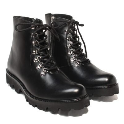 Black handcrafted leather chunk sole boots by Shoe Bespoke with lace-up front, metal eyelets, and rugged rubber outsole.